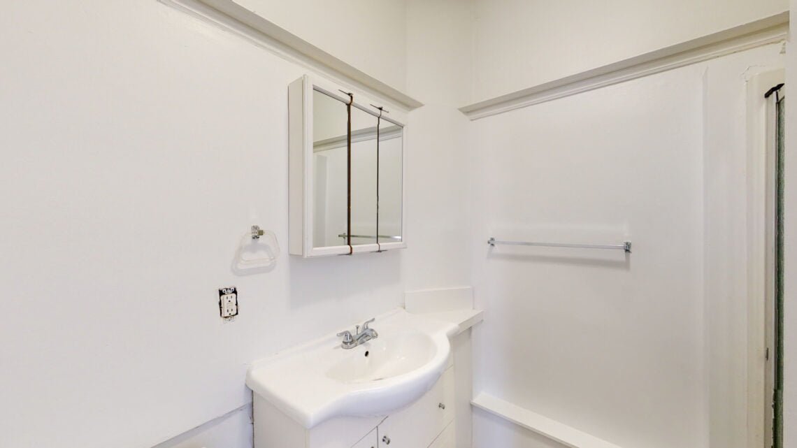 bathroom with view sink and bathtub