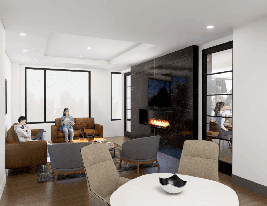 A cozy living tenant lounge featuring a fireplace, where a woman is seated on a couch. The room includes various furniture elements such as a coffee table and decorative pillows, along with stylish interior design details.